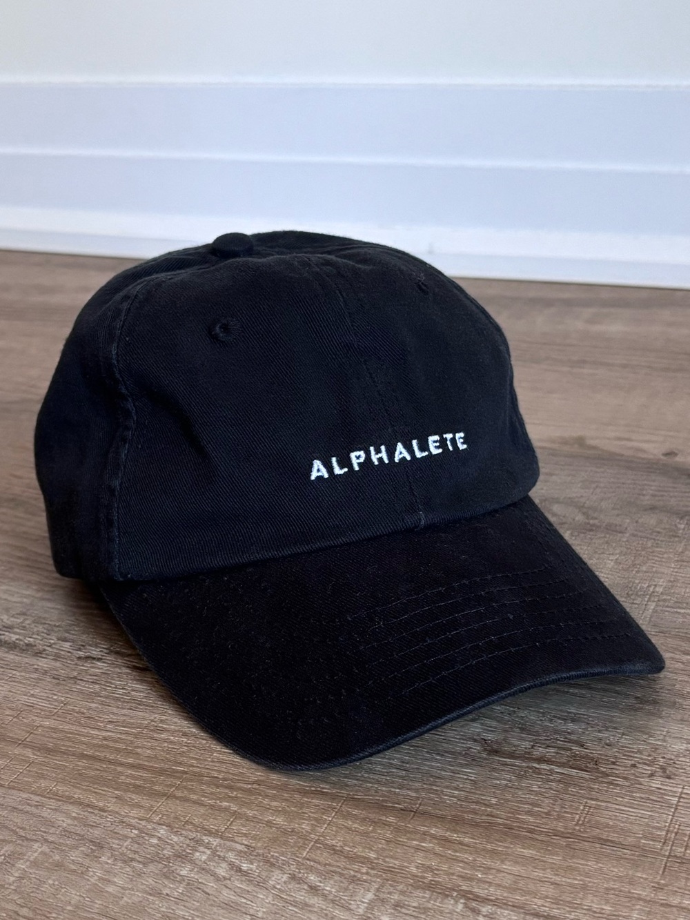 Alphalete Black Unisex Cap in Black with White Logo